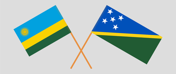 Crossed flags of Rwanda and Solomon Islands. Official colors. Correct proportion