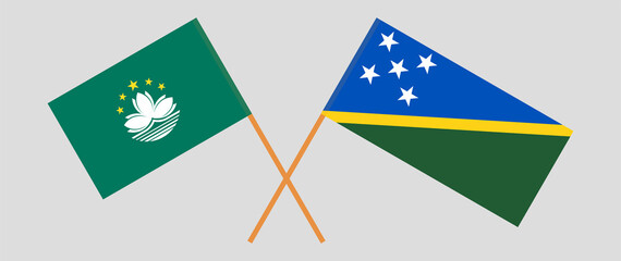Crossed flags of Macau and Solomon Islands. Official colors. Correct proportion