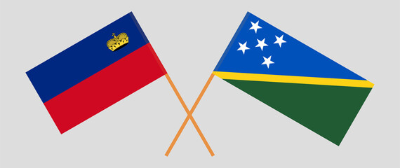 Crossed flags of Liechtenstein and Solomon Islands. Official colors. Correct proportion