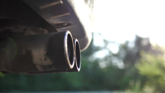 exhaust gases from the exhaust pipe of a car. environmental problems. Exhaust pollution. Climate change, ecology, atmospheric gas, ozone layer, smoke