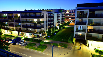 Modern apartment buildings at night.  