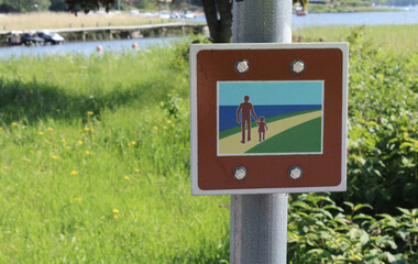 Informational road sign Finland along scenic walking path. - 510321031