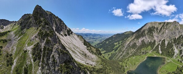 Mountain range with green parts of bushes. Oberstdorf, Alps.