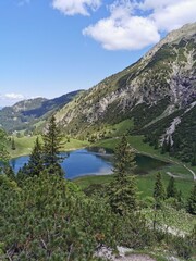 The lake in the mountains in the Oberstdorf, Tirol Alps. Summer time.