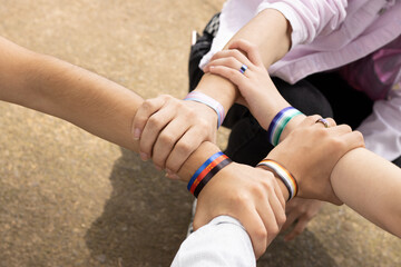 lgtbiq+ hand bracelet Costa Rica Pride month.  
rainbow hand bracelet for people LGTBIQ+