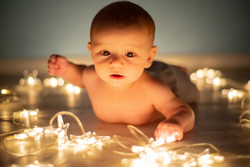 beautiful baby with christmas lights