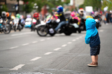 a boy watching parade