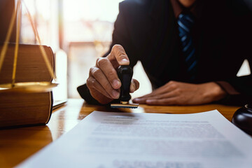 Lawyer working with documents. Justice and law concept. Attorney working with contract papers and...