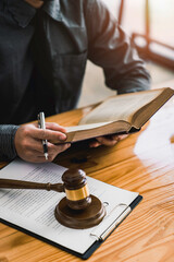 Attorney reading law code, studying constitution to protect human rights closeup, Male lawyer or...