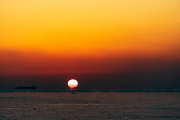 sunrise over the sea covered with sea fog / Gangyang-li, Onsan-eup, Ulju-gun, Ulsan
