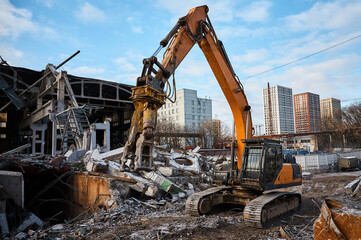 Excavator with hydraulic scissors cuts reinforced concrete