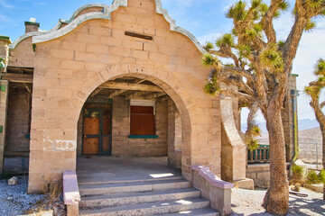 Obraz premium Rhyolite abandoned train station entrance in Ghost Town