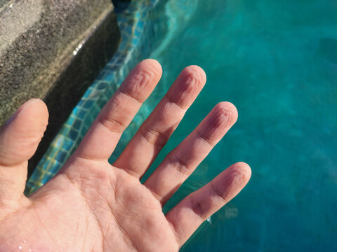 My hand from swim for a long time,withered hand,withered finger.