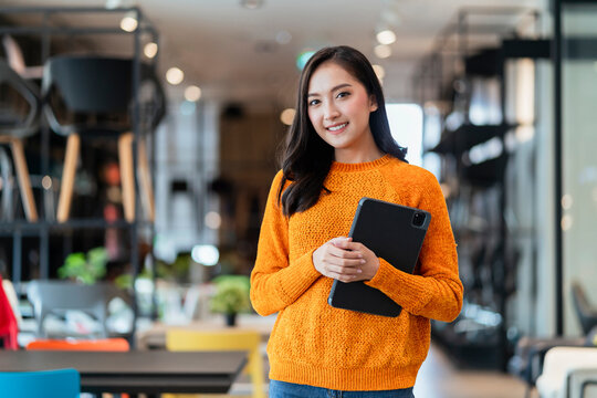 Asian Female Smart Entrepreneur Walk Working Use Tablet Device Stock Manage And Checking Product Inventory In Furniture Showroom,asian Woman Smiling Cheerful Business Owner Work In Furniture Store