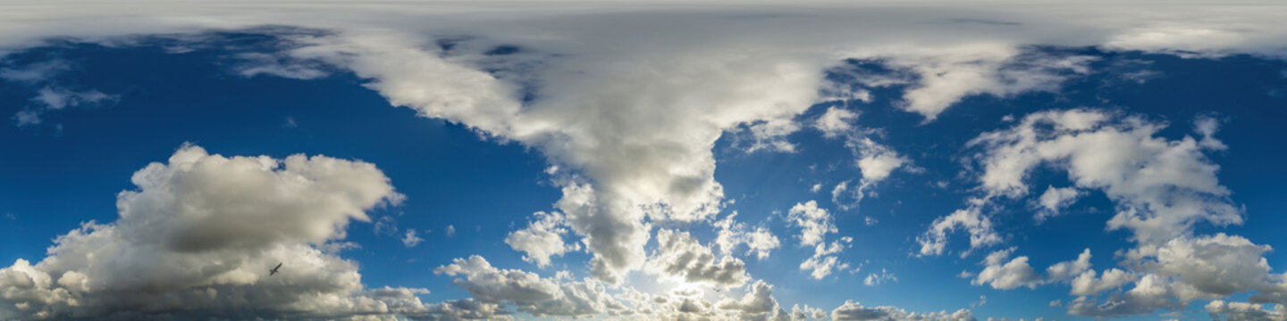 Blue sky panorama with puffy Cumulus clouds. Seamless hdr pano in spherical equirectangular format. Sky dome or zenith for 3D visualization, game and sky replacement for aerial drone 360 panoramas.