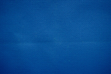Closeup of blue fabric texture for background used. Pattern blue dark denim, linen, natural cotton...
