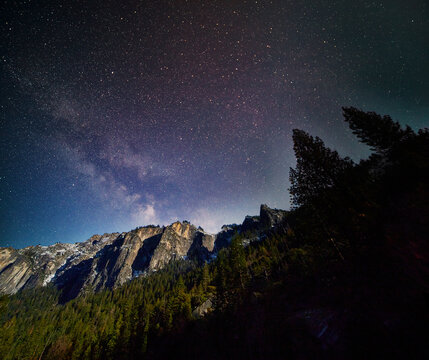 Milky Way and stars over Yosemite park - Powered by Adobe