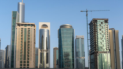 Dubai, United Arab Emirates. View of modern skyscrapers and buildings at Dubai Marina. Iconic destination. Luxury skyscrapers for homes, hotels and offices