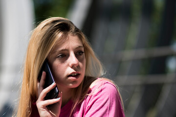 Fototapeta premium talking on her mobile