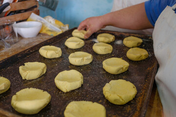 Latin American pastry chef preparing Mexican polvorones. Mexican Pastry. Mexican pastry chef.