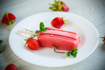 cooked homemade strawberry ice cream on a stick
