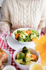 Fototapeta na wymiar woman having vegetables for thanksgiving dinner at home kitchen