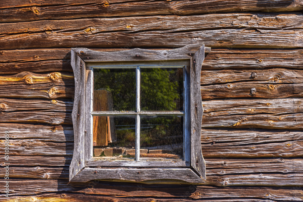 Poster Window on an old timbered barn