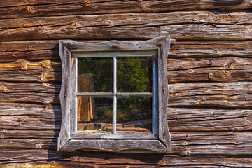 Window on an old timbered barn