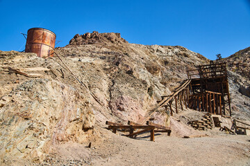 Fototapeta na wymiar Old mining equipment at Keane Wonder Mine in Death Valley National Park