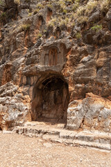 Naklejka premium Ruins of a rock-cut temple Khirbat Panyas Banyas near a national park in northern Israel