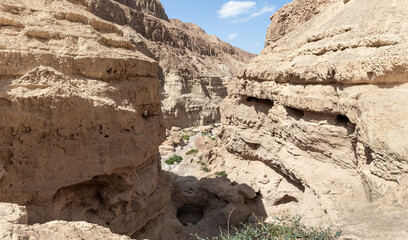 Natural  stone arch in dry river bed passing through the stone desert near the Khatsatson stream,...