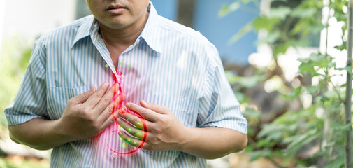 image of design humans stomach graphic with suffering men  Body ,GERD, Acid Reflux Disease Symptoms Or Heartburn, Concept With Healthcare And Medicine