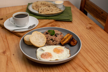 Gallo pinto costa rica traditional breakfast with black coffee and tortillas
