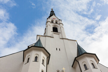 Bad Tölz, Germany - Feb 2, 2022: Front view of church Mariä Himmelfahrt.
