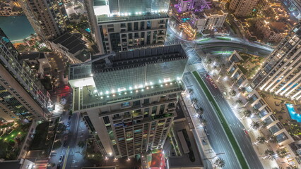 Aerial look down view of a big futuristic city night timelapse. Business bay and Downtown © HyperlapsePro