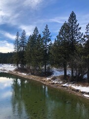 The view of Truckee river on a sunny winter day in North Lake Tahoe, California. Mountain river in Sierras. West coast vacation destinations. California roadtrip. 