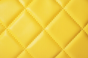 Fragment accessories of an yellow quilted bag