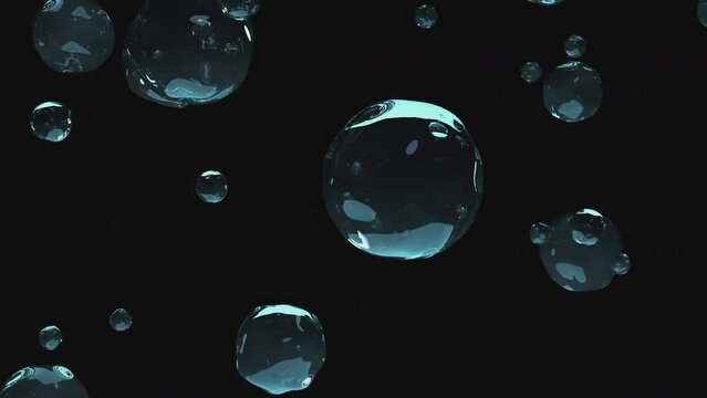Large transparent drops of liquid slowly fall on a transparent background