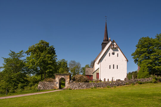 Tingvoll church, Nordm&oslash;rsdomen, Norway. This church is a white stone church from 1180. Beautiful surroundings. 