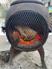 It's a fireplace and firewood on a cold winter day