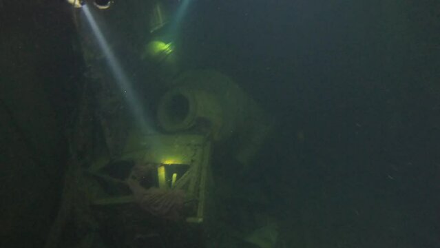 Scuba Divers Swims On The Shipwreck Swedish Ferry Zenobia. Wreck Diving in Larnaca, Cyprus.