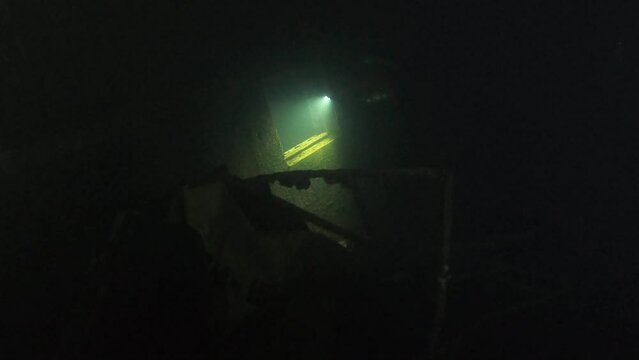 Scuba Divers Swims On The Shipwreck Swedish Ferry Zenobia. Wreck Diving in Larnaca, Cyprus.