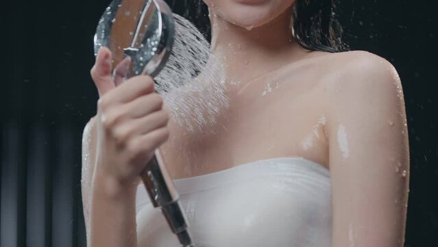 the young  woman bathing  with Rain shower no face 