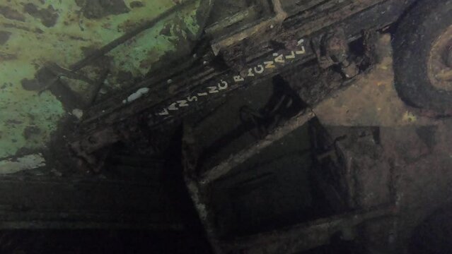 Scuba Divers Swims On The Shipwreck Swedish Ferry Zenobia. Wreck Diving in Larnaca, Cyprus.