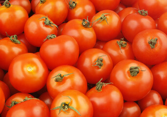 Ripe tomatoes background or texture.	