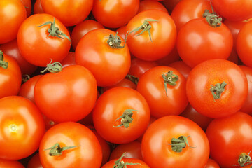 Ripe red tomatoes background or texture.	