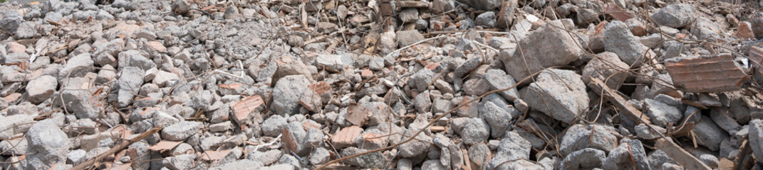 ruined concrete debris background. Front view