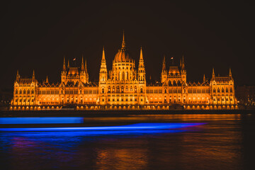 Fototapeta premium Hungarian parliament building from across the Danube river at night Budapest Hungary