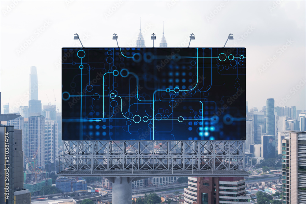 Poster technology hologram on billboard over panorama city view of kuala lumpur. kl is the largest tech hub