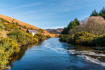 Fototapeta na wymiar Autumn river landscape. Irish countryside landscape.